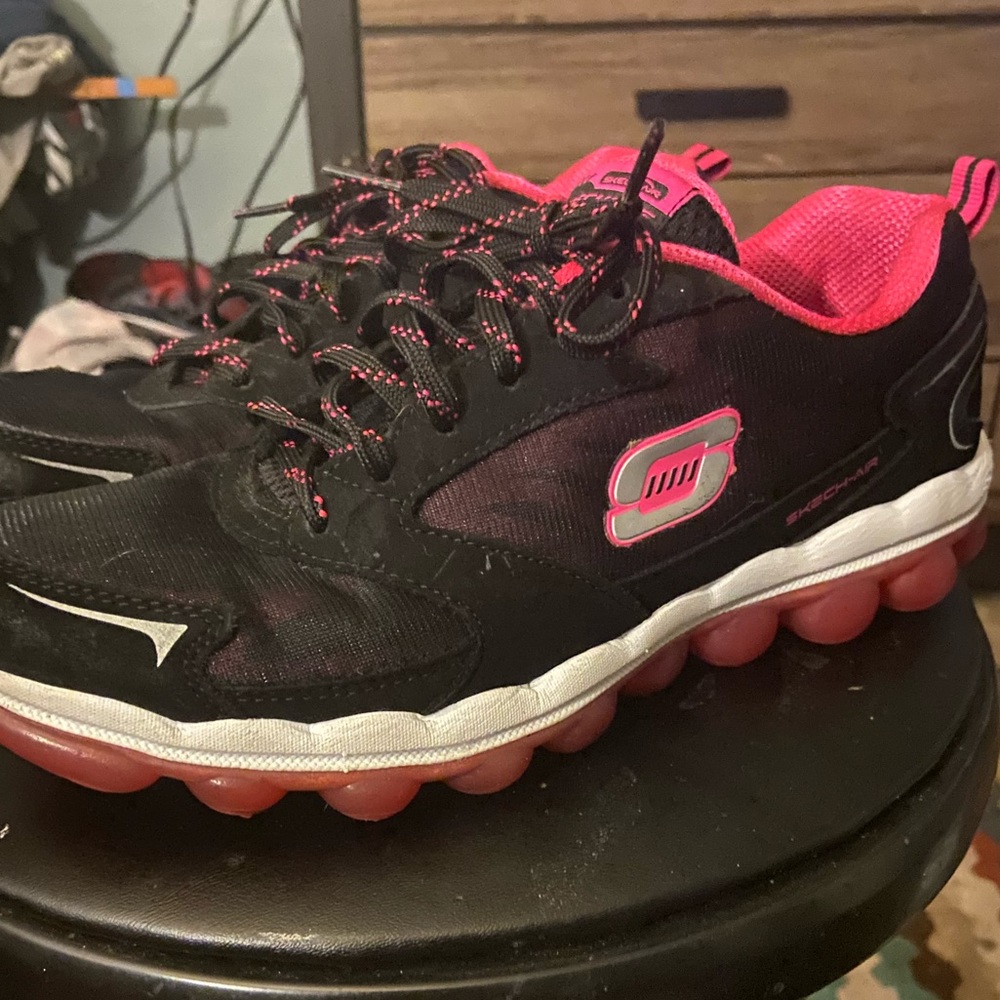 Woman’s size 8 sketchers running shoes lightly worn.